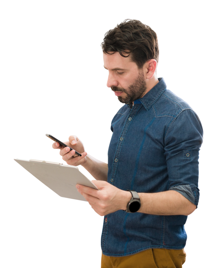 Photo of a professionally dressed man holding a clipboard in one hand and a mobile device in the other to indicate that non-technical buyers need a business broker who has a technical due diligence checklist.